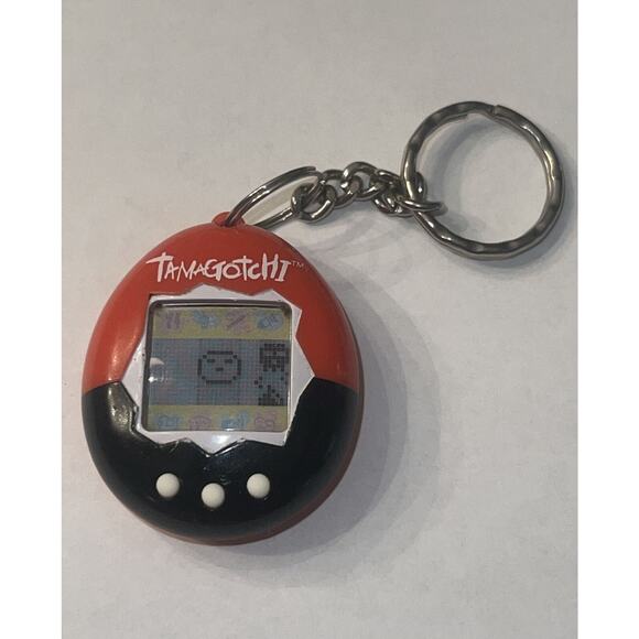 Vintage Bandai Tamagotchi 1997 Red & Black Digital Pet Keychain Tested/Works - Picture 1 of 3